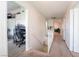 Hallway with carpet, white trim, and doors leading to other rooms at 3200 Mariner Bay St, Las Vegas, NV 89117