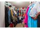 Spacious walk-in closet with double hanging rods and shelving provides ample storage space for any wardrobe at 3200 Mariner Bay St, Las Vegas, NV 89117