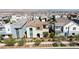 This aerial view showcases a modern neighborhood with well-maintained homes and manicured landscaping at 3369 Ponicelli Ln, Henderson, NV 89044