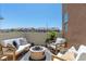 Relaxing patio area complete with comfortable seating and a cozy fire pit at 3369 Ponicelli Ln, Henderson, NV 89044