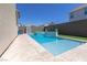 Relax and unwind in this backyard pool with a spa and a spacious patio for outdoor enjoyment at 3369 Ponicelli Ln, Henderson, NV 89044