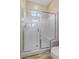 Bright bathroom showcasing a modern shower with a built-in seat, complemented by modern finishes at 34 Costa Tropical Dr, Henderson, NV 89011