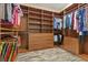 Organized walk-in closet with custom shelving and drawers for maximum storage and easy organization at 34 Costa Tropical Dr, Henderson, NV 89011