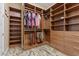 Spacious walk-in closet features custom shelving, drawers, and ample hanging space at 34 Costa Tropical Dr, Henderson, NV 89011
