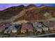 Charming single-Gathering homes showcasing well-manicured landscaping and desert landscape at 34 Costa Tropical Dr, Henderson, NV 89011