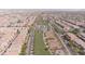 Aerial community view featuring basketball courts, swimming pools, and walking paths between homes at 3447 Sw Covilha Ln, Henderson, NV 89044