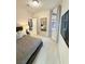 Inviting bedroom with carpet, decor, and a window with a view of the backyard at 3447 Sw Covilha Ln, Henderson, NV 89044