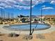 Community Park with sports courts, playgrounds, picnic spots, and water play features at 3447 Sw Covilha Ln, Henderson, NV 89044