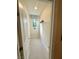 Bright walk-in closet featuring carpet floors, a window, and shelving on the upper portion of the wall at 3447 Sw Covilha Ln, Henderson, NV 89044