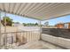 Covered balcony with metal railing offers neighborhood views at 3471 One Nation Ave, Las Vegas, NV 89121