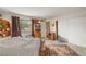 Cozy bedroom featuring built-in shelves, large window, and a spacious closet at 3471 One Nation Ave, Las Vegas, NV 89121
