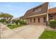 Brick home featuring a unique architectural design and well-maintained front yard at 3471 One Nation Ave, Las Vegas, NV 89121