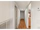 Hallway features hardwood floors and access to rooms at 3471 One Nation Ave, Las Vegas, NV 89121