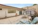 Relaxing backyard patio area with lounge chairs and outdoor storage at 3471 One Nation Ave, Las Vegas, NV 89121