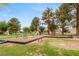 Community playground with various play structures, providing a fun space for children to play at 3471 One Nation Ave, Las Vegas, NV 89121