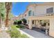 View of the backyard and rear exterior with covered patio and low-maintenance landscaping at 3873 Palm Island Ct, Las Vegas, NV 89147