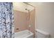 Bathroom shower with a decorative shower curtain at 3873 Palm Island Ct, Las Vegas, NV 89147