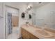 Bathroom with a double sink vanity and separate toilet and shower at 3873 Palm Island Ct, Las Vegas, NV 89147
