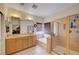 Bright bathroom featuring a double sink vanity and a glass enclosed shower at 3873 Palm Island Ct, Las Vegas, NV 89147