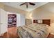 Spacious bedroom offering hardwood floors, natural light and a ceiling fan at 3873 Palm Island Ct, Las Vegas, NV 89147