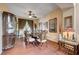 Elegant dining room featuring ornate furniture, wood floors, and a classic chandelier at 3873 Palm Island Ct, Las Vegas, NV 89147