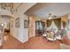 Traditional dining room with wood floors, decorative furnishings, and stylish ceiling fan at 3873 Palm Island Ct, Las Vegas, NV 89147