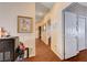 Second story hallway with wood floors leading to multiple rooms at 3873 Palm Island Ct, Las Vegas, NV 89147