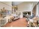 Bright living room with high ceilings, hardwood floors, staircase, and decorative touches at 3873 Palm Island Ct, Las Vegas, NV 89147