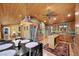 Bright eat-in kitchen with stainless steel refrigerator at 3935 White Fir Way, Mount Charleston, NV 89124