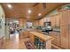 Spacious kitchen with an island and stainless steel appliances at 3935 White Fir Way, Mount Charleston, NV 89124