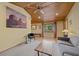 Comfortable living room with wood paneling, lots of natural light, and tasteful decor at 3935 White Fir Way, Mount Charleston, NV 89124