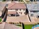 Aerial shot of a home featuring a spacious backyard area with patio, offering a desirable outdoor living space at 425 Canary Song Dr, Henderson, NV 89011