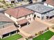 Overhead view of the property showcasing a large, walled backyard, covered patio, and well-maintained landscaping at 425 Canary Song Dr, Henderson, NV 89011