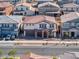Neighborhood aerial view showcasing new two-story homes with attached garages and desert landscaping at 425 Canary Song Dr, Henderson, NV 89011