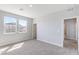 Bedroom featuring natural light and an ensuite bathroom at 425 Canary Song Dr, Henderson, NV 89011