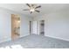 A view of a bedroom that connects to a bathroom and walk-in closet at 425 Canary Song Dr, Henderson, NV 89011