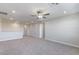 A spacious bonus room with carpet, ceiling fan, and recessed lighting at 425 Canary Song Dr, Henderson, NV 89011
