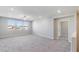 A large bonus room with a ceiling fan and natural light at 425 Canary Song Dr, Henderson, NV 89011