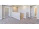 View of the upstairs hallway with gray carpet at 425 Canary Song Dr, Henderson, NV 89011