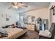 Bedroom featuring a ceiling fan, natural light, and dresser at 4259 Kona Coast Way, Las Vegas, NV 89121