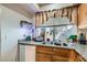 Well lit kitchen area with granite countertops at 4259 Kona Coast Way, Las Vegas, NV 89121