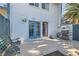 Inviting back patio with barbecue, privacy fence, and outdoor seating at 4259 Kona Coast Way, Las Vegas, NV 89121