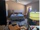 Bedroom featuring vaulted ceilings, ceiling fan, window, and various furnishings at 5004 Deep Forest Dr, Las Vegas, NV 89130