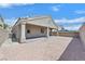 Home backyard with covered patio at 5517 Meridian Rain St, North Las Vegas, NV 89031