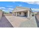 Low maintenance backyard with covered patio, perfect for outdoor enjoyment and relaxation at 5517 Meridian Rain St, North Las Vegas, NV 89031