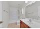 Bright bathroom featuring a shower-tub combo and vanity with sink at 5517 Meridian Rain St, North Las Vegas, NV 89031