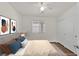 Bedroom featuring wood floors, neutral walls, and sliding closet doors at 5517 Meridian Rain St, North Las Vegas, NV 89031