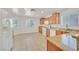 Bright kitchen featuring granite countertops, stainless steel appliances, and tile floors at 5517 Meridian Rain St, North Las Vegas, NV 89031