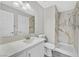 Modern bathroom featuring marble shower tile, a single vanity and contemporary finishes at 600 Baysville Ct, Las Vegas, NV 89144