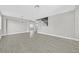 Spacious living room with hardwood floors and neutral walls that create a bright open space at 600 Baysville Ct, Las Vegas, NV 89144